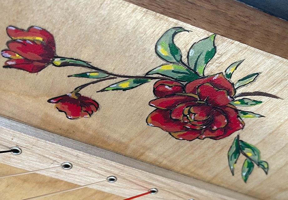 Custom decoration detail: carving, gold leaf or soundboard painting