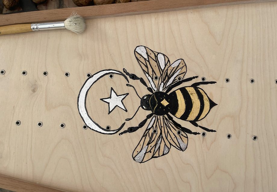 Custom decoration detail: carving, gold leaf or soundboard painting